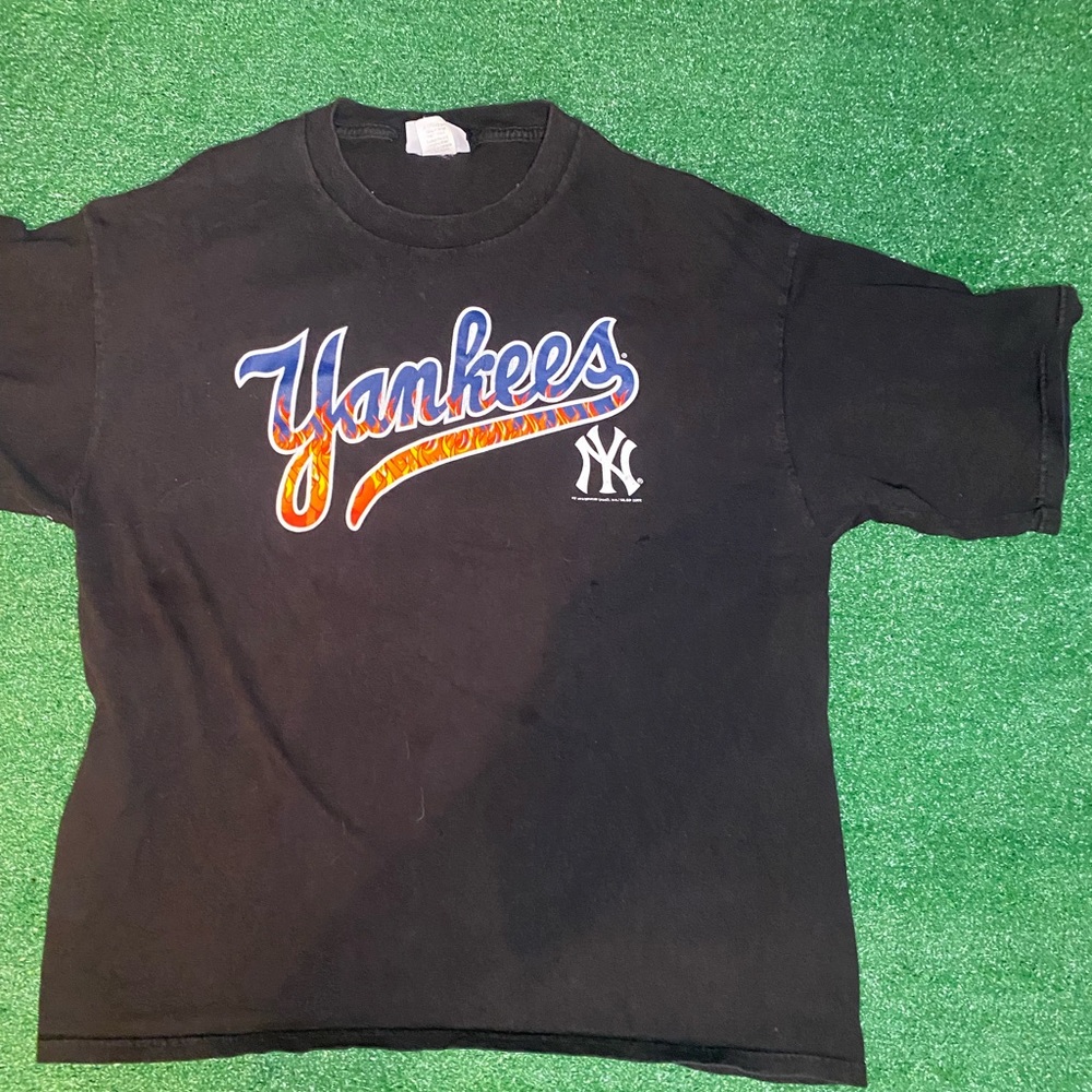 Faded, oil stained and a few pin holes